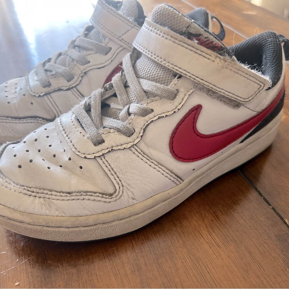 Used Nike shoes red and black. Youth size 1Y